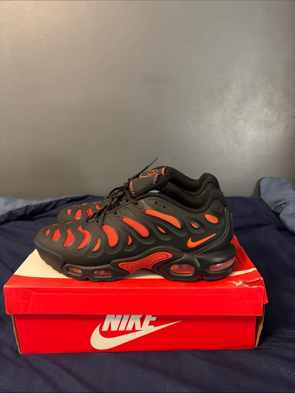 Nike Black and Orange Air Max Plus TN Athletic Sneakers